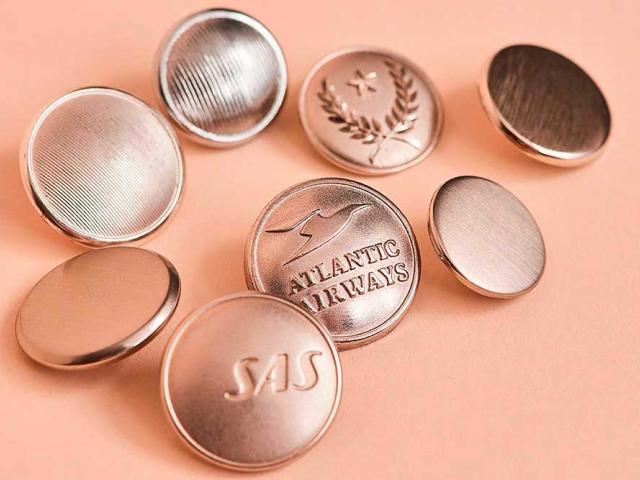 Silver colored logo buttons