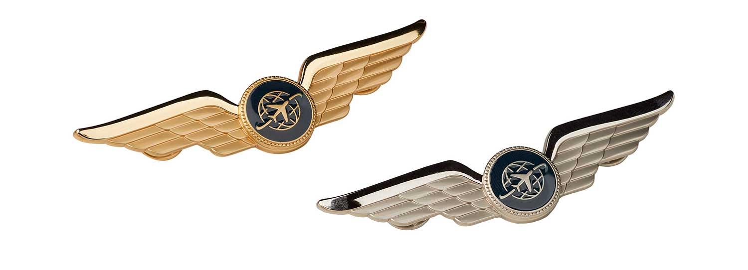 Silver colored and golden colored ready made pilot wings by Olino