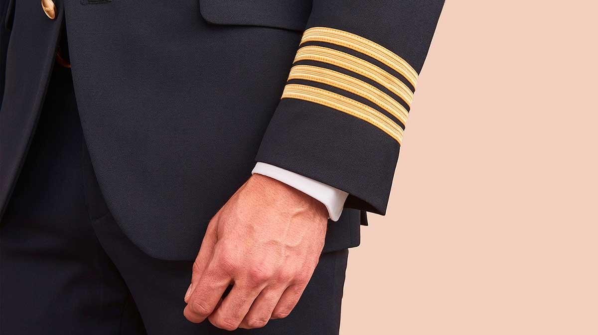 Pilot ranking stripes on the sleeves of the jacket