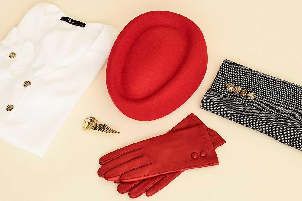 Uniform accessories as hat, gloves, wings and buttons