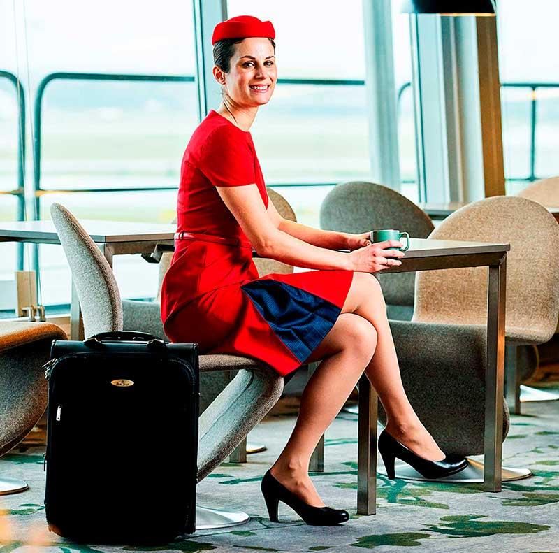 Red dress for flight attendants made by Olino